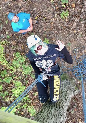 Rappelling down off of a high element at the Randallstown Ropes Course.