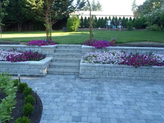 Helped this family get ready for a backyard wedding by installing a paver patio and block wall.