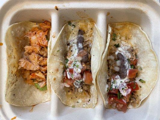 Buttered lobster and carnita tacos