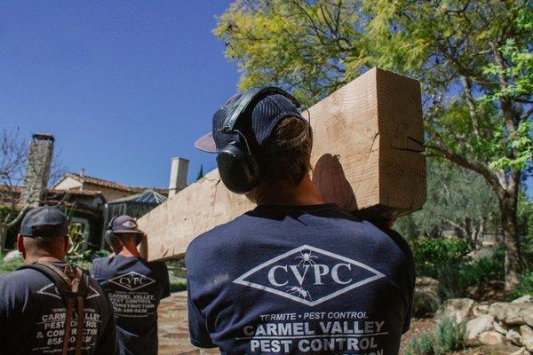 The crew prepping and installing a piece of reclaimed wood in this beautiful home in Rancho Santa Fe!