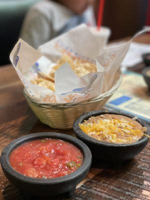 Complimentary chips salsa and bean dip.