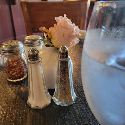 Cute flower on table. Can here the mariachi next door.