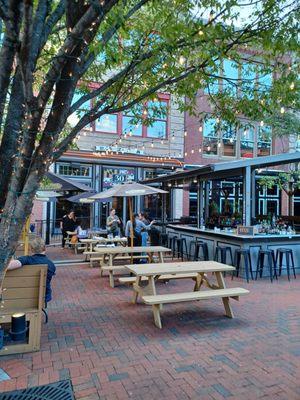 Store front with outdoor seatings.