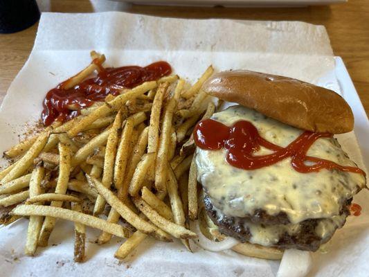 Double Cheeseburger with pepper jack cheese and Cajun seasoning on fries