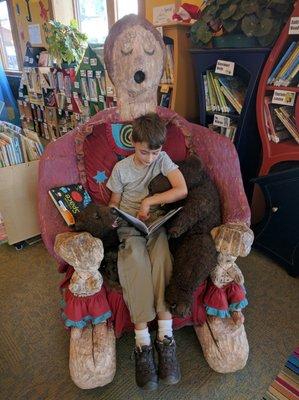 Cozy reading with stuffed buddies