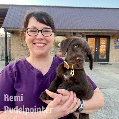 Remi her very first puppy visit with Dr. Tara