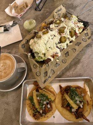 Tacos al pastor and meat nachos! My Mexican choice