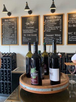 Serving area showing the red offerings in the wine tasting.