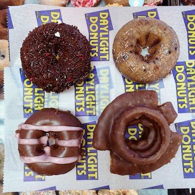 Clockwise starting on top left corner : Triple Chocolate  Blueberry  Chocolate old fashion  Chocolate covered strawberry