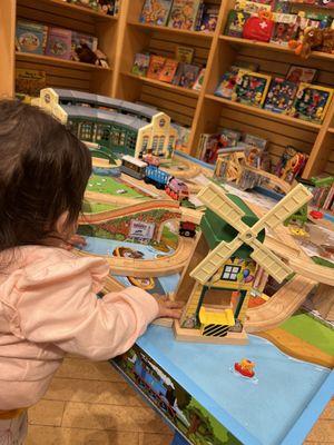 My daughter playing with the train set at Barnes N Nobles Bookstore.