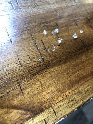 Some of the glass shards/flakes left inside after vacuuming with roomba and Dyson using the boost.