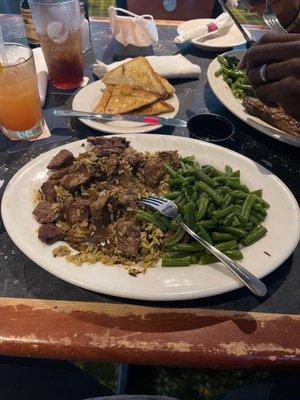 Beef rib tips with wild rice and and string beans