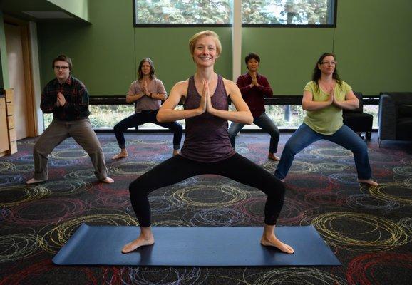 Goddess pose with Nadine Blinn from Balanced Humans Office Yoga