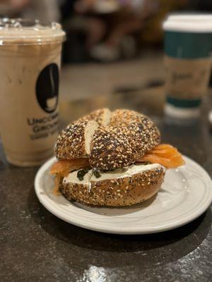 Smoked salmon with plain cream Cheese on an everything bagel'