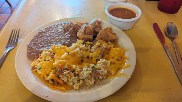 Migas. Delicious. $6.55 +$1 for cheese.