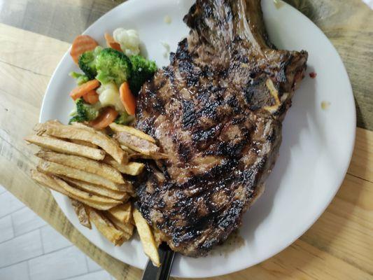 Steak was cooked very well in medium rare and flavorful seasoning. French fries needs to be more crunchy then it's perfect .