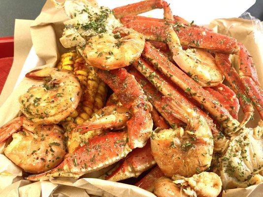 3 Crab clusters, 10 pieces jumbo shrimp, sausage, egg, potatoes with Cajun garlic sauce