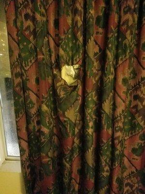 duct tape a perfect fix for a torn curtain