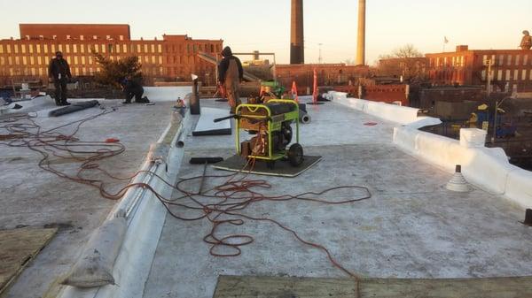 This was a 3 family flat in historical Tower Grove that was built in 1889. we removed 6 layers of 3 different  roofing system...