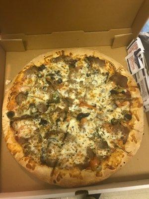 Greek Delight pizza - spinach, black & green olives, tomatoes, feta cheese, garlic and mozzarella with gyro meat added.