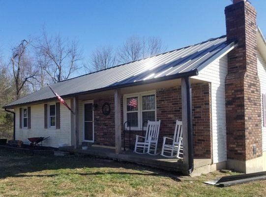 Metal panel roof replacement.