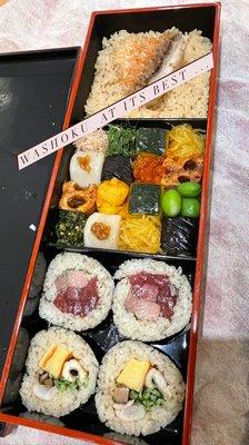 The obento comes in an authentic box to keep. Not a throw-away container. The presentation is eye candy.