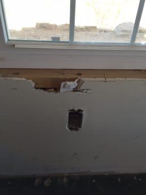 Unrepaired drywall left like this after PCHS promised that drywall repair was included on job.