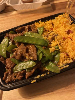 Beef and snow peas with pork friend rice- little to zero flavor.