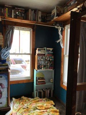 K9 Clooney corners with repurposed dressers drawers and made shelf's for my books!