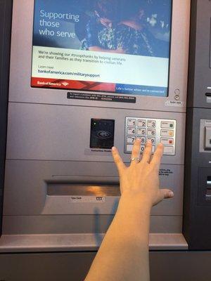 New drive-through ATMs too high for the average car!  My hand stretched to the max can't even reach touch screen!