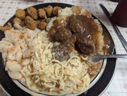 Meatballs over mashed potatoes, chicken spheggetti, Lima beans, and fried okra with sweet tea!