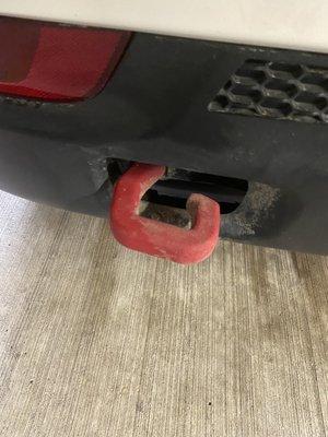 Dirt not wiped off tow hook.