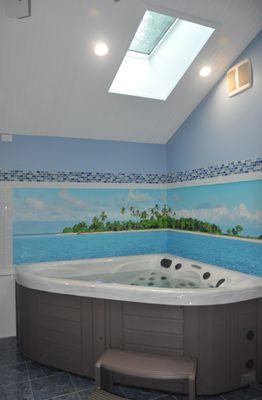 Hot Tub Inside a home with a mural