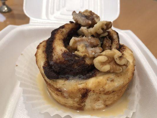 Cinnamon bun with walnut and a delicious  sugary glaze.