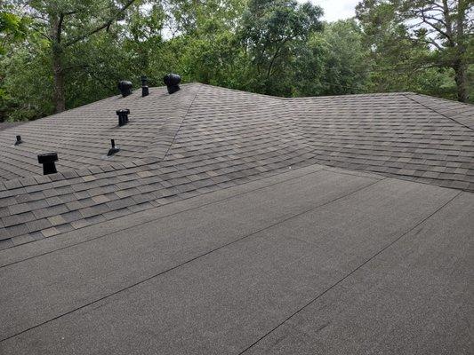 Finished product of flat roof and shingles