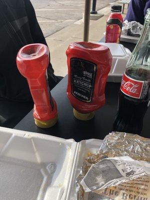 Empty ketchup bottles.