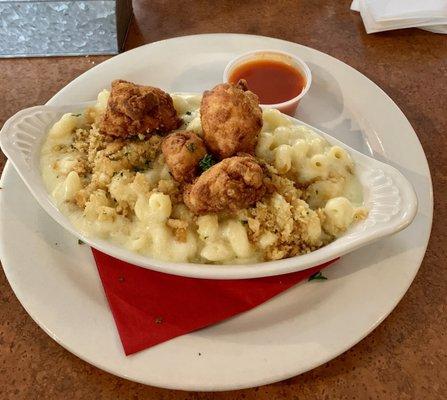 Lunch mini Mac & cheese with buffalo sauce on the side