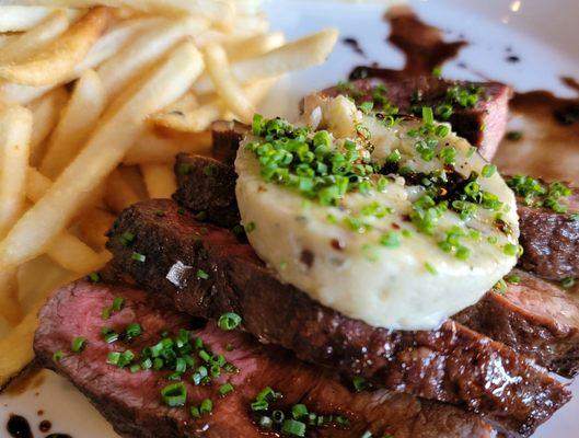 Steak and fries, with butter and blue.