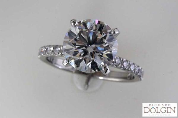 Engagement Ring with Round Diamond and Minimal Diamond Band