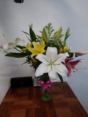 Lilies 3 different colors w/glass base.  $25