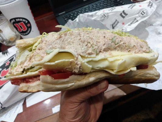 Tuna sub with provolone cheese or get it without. Massive and yummy.