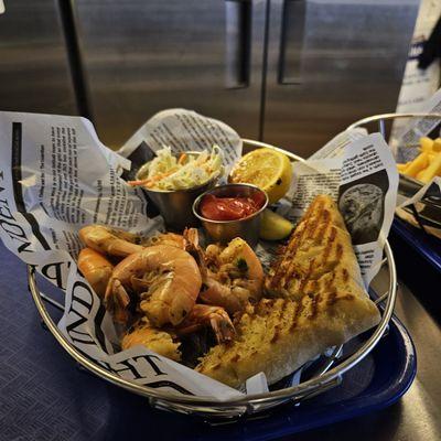 Peel your own half pound of wild caught shrimp, served with house made cocktail and hot butter sauce, with garlic-herb focaccia bread.