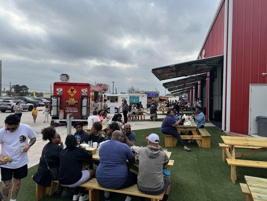 Outside seats and some of the food trucks