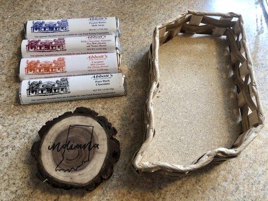 My Indiana-themed purchases (Abbott's chocolate, real wood coasters, and my favorite, the Indiana shaped basket)