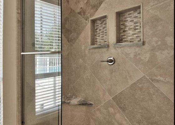 Custom shower door in master bathroom.