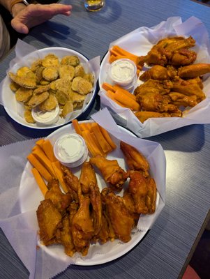 medium wings, hot wings, and fried pickles