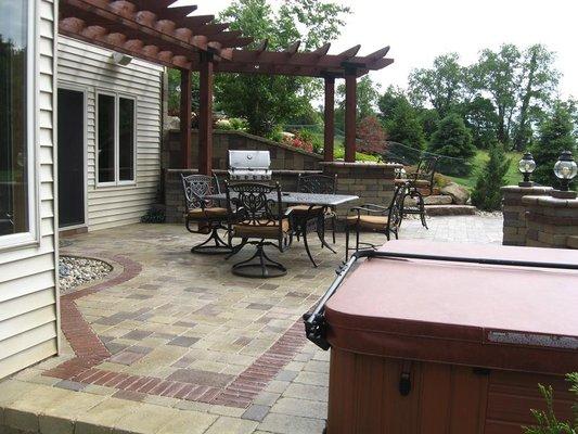 Outdoor patio with a pergola.