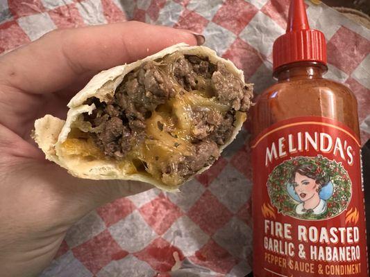 No salsa was provided with my steak/cheese burrito combo so I broke out the Melinda's. (3/6/2024)