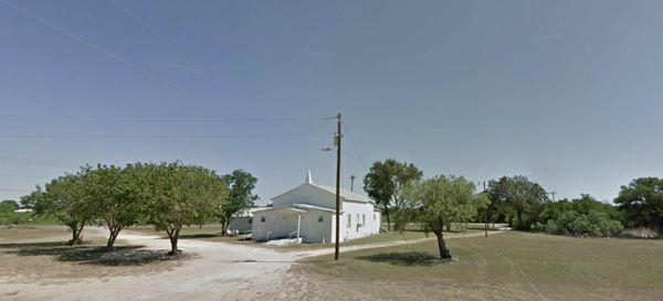 The small Parks Spring Church beside the cemetery.