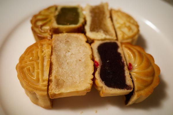 Assorted mini mooncakes (TL clockwise - matcha, pumpkin, red bean, coconut)